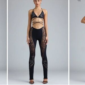 oh polly stevie embellished mid-rise flared trousers in black